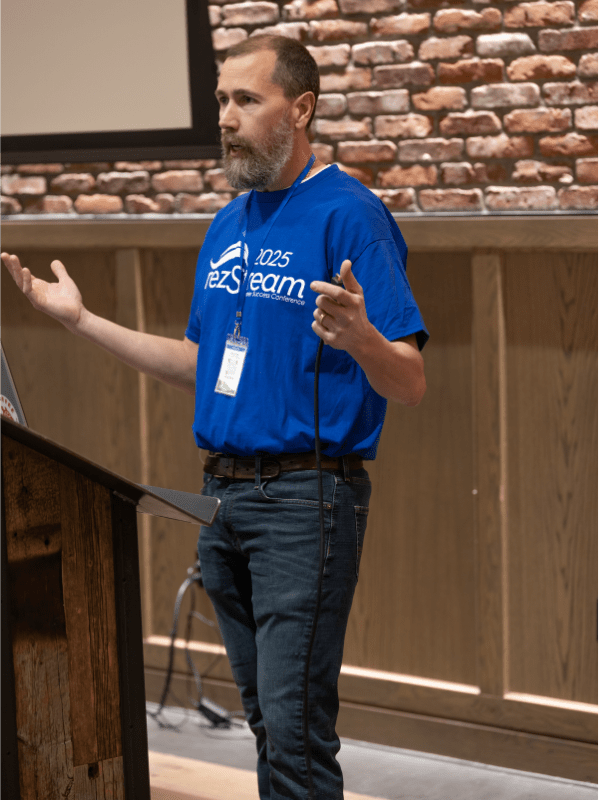 James Glinsek, VP of Product Development at rezStream, presenting product updates during the 2025 Customer Success Conference.
